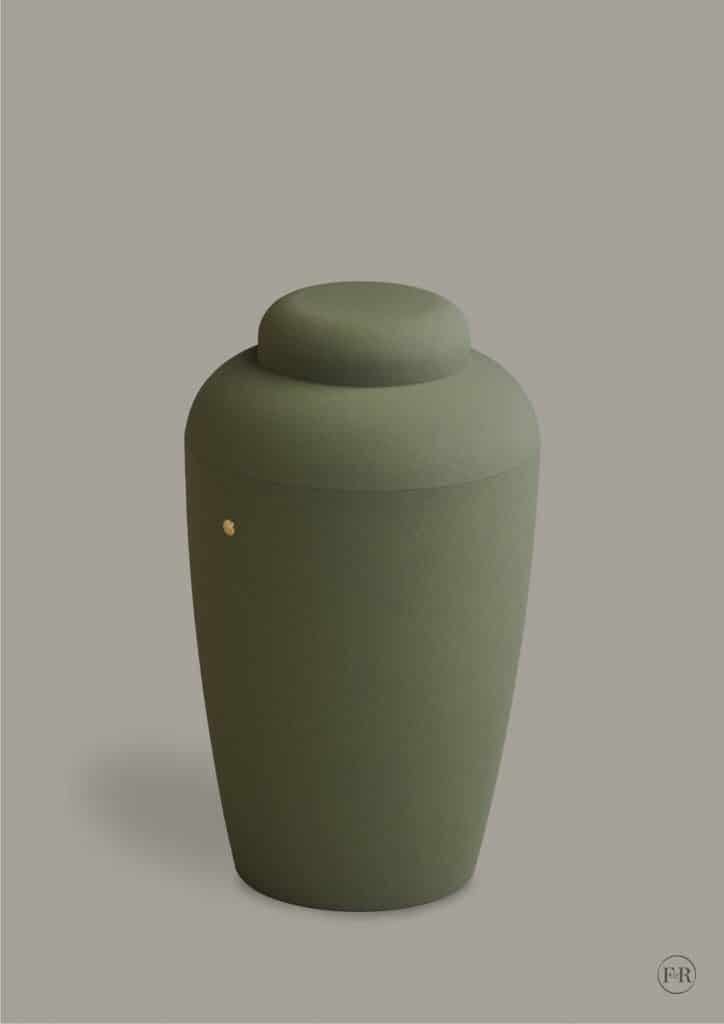 Grøn keramisk urne på grå baggrund